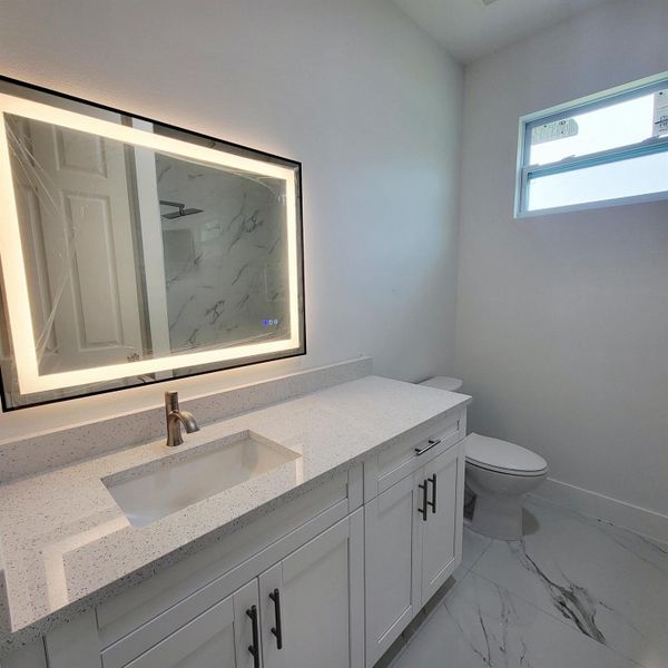 Furnished interior view inside a new home in , Okeechobee (Image 10).