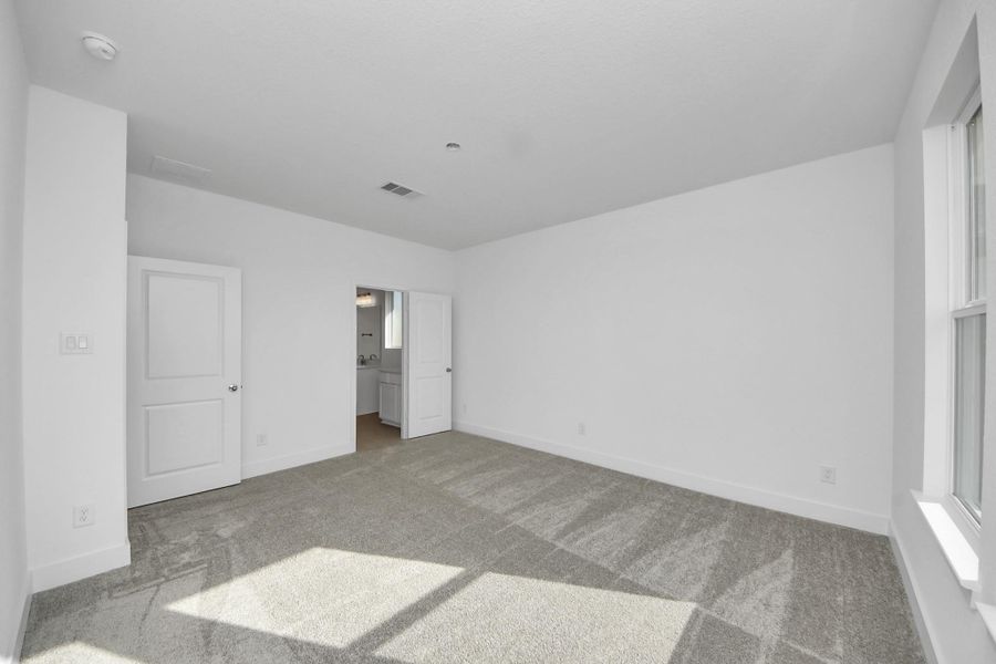 Spacious, unfurnished interior of a new home in The Canopies, Splendora (Image 14).