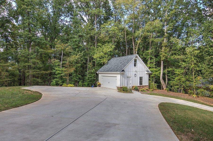 Front exterior of a new home in , Cartersville, GA, highlighting curb appeal (Image 25).