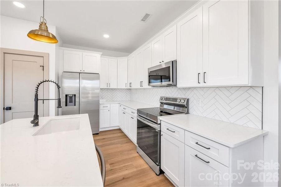 Furnished interior view inside a new home in , Hickory (Image 10).
