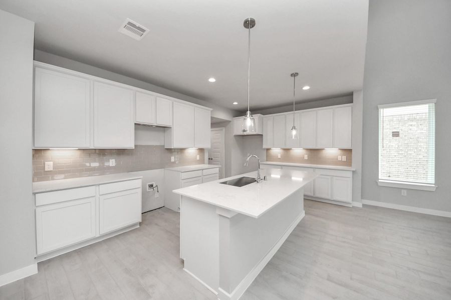 This kitchen is truly a chef's dream! Sample photo of completed home with similar floor plan. Actual colors and selections may vary. This kitchen is truly a chef's dream! Sample photo of completed home with similar floor plan. Actual colors and selections may vary.