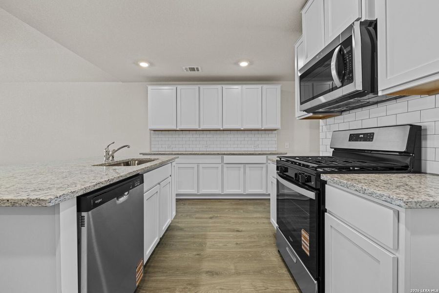 Furnished interior view inside a new home in Redbird Ranch, San Antonio (Image 6).