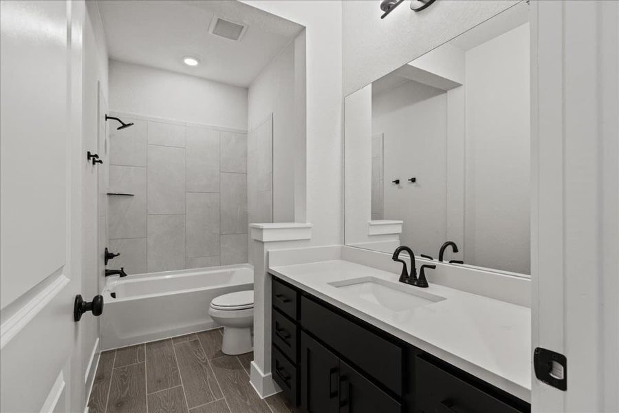 Furnished interior view inside a new home in Village at Three Oaks, Seguin (Image 13).