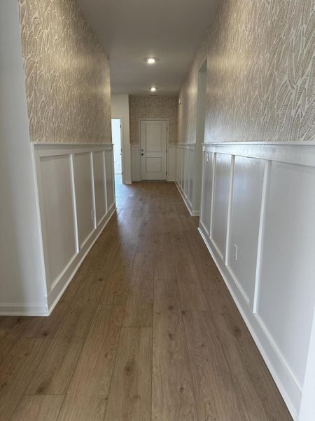 Spacious, unfurnished interior of a new home in Horizons at Carnes Crossroads | 55+: Legends Collection, Summerville (Image 10). Spacious, unfurnished interior of a new home in Horizons at Carnes Crossroads | 55+: Legends Collection, Summerville (Image 10).