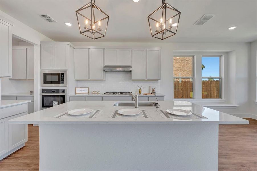 Furnished interior view inside a new home in Chaparral Park, Oak Point (Image 9).
