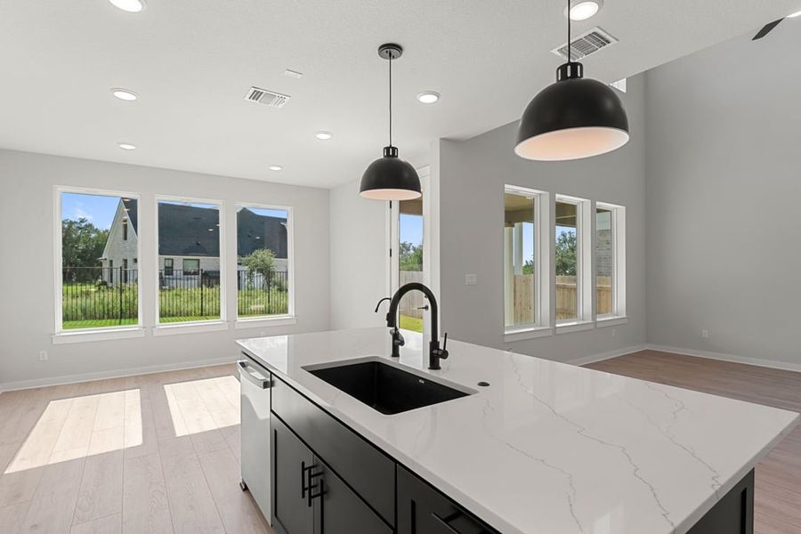 Furnished interior view inside a new home in Terrace Collection at Lariat, Liberty Hill (Image 12). Furnished interior view inside a new home in Terrace Collection at Lariat, Liberty Hill (Image 12).