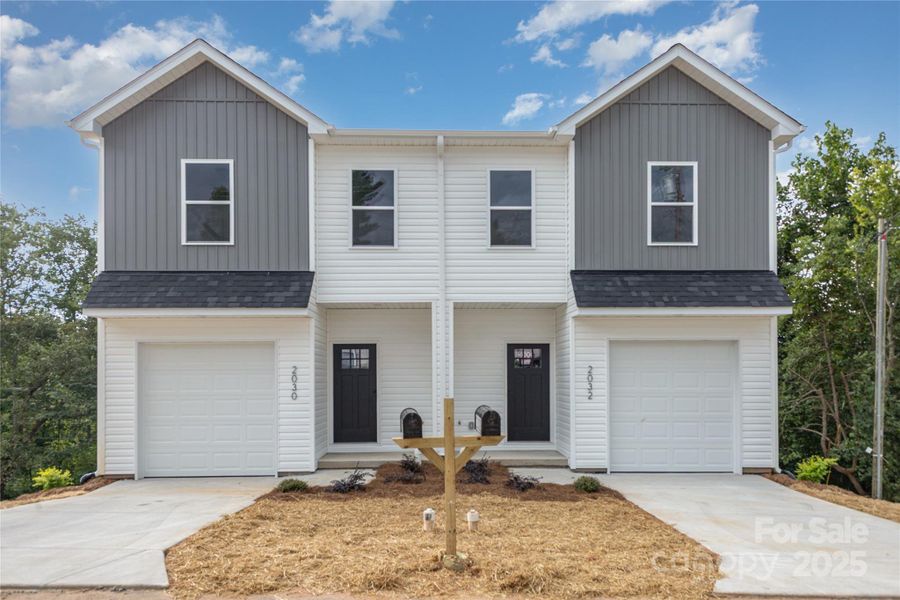 Front exterior of a new home in , Hickory, NC, highlighting curb appeal (Image 21).