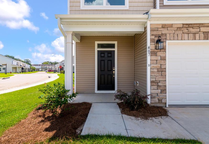 Exterior details and patio area of a home in The Landings at Montague, Goose Creek (Image 2). Exterior details and patio area of a home in The Landings at Montague, Goose Creek (Image 2).