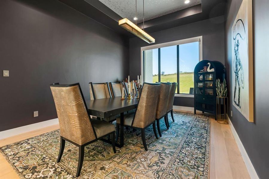 Dining space featuring recessed lighting and light wood-style floors Dining space featuring recessed lighting and light wood-style floors
