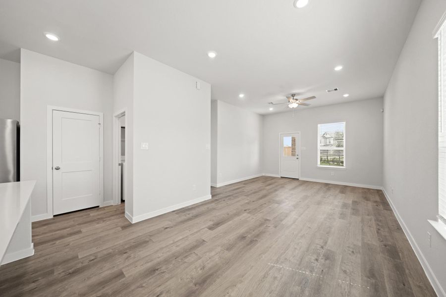 Spacious, unfurnished interior of a new home in Creekland Village at Bridgeland, Cypress (Image 14).