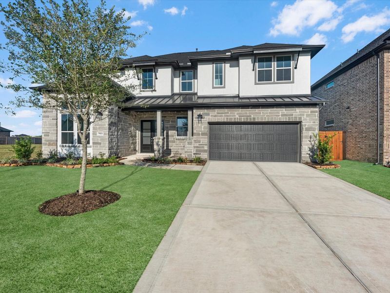 Front exterior of a new home in Trillium, Richmond, TX, highlighting curb appeal (Image 2). Front exterior of a new home in Trillium, Richmond, TX, highlighting curb appeal (Image 2).