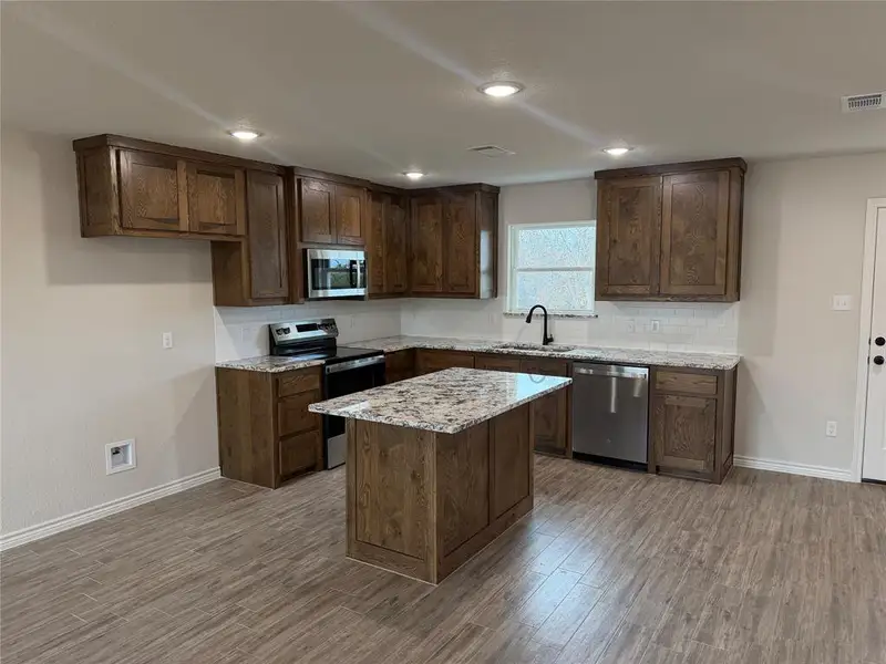 Furnished interior view inside a new home in , Azle (Image 1). Furnished interior view inside a new home in , Azle (Image 1).