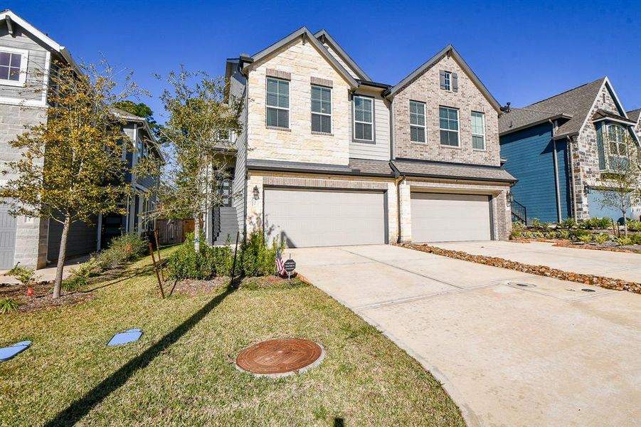 This charming two-story townhome offers plenty of space for comfortable living and effortless entertaining. The open floor plan features wood-look tile flooring, neutral paint, chic lighting and fans, and an abundance of natural light. Highlights include a sleek modern fireplace, a stunning island kitchen, a versatile bonus room, and spacious bedrooms with walk-in closets. Come see for yourself—you won’t be disappointed!