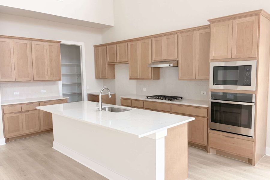 Furnished interior view inside a new home in The Grove at Blackhawk, Pflugerville (Image 6). Furnished interior view inside a new home in The Grove at Blackhawk, Pflugerville (Image 6).