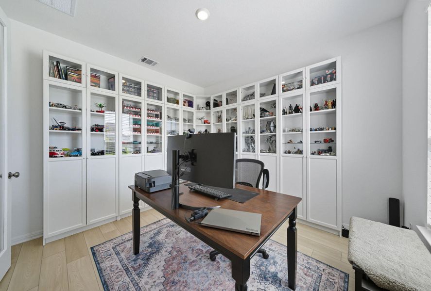 Office area featuring light wood-style flooring Office area featuring light wood-style flooring