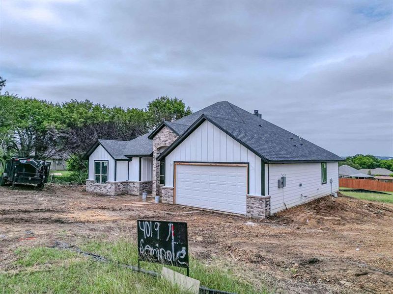 Exterior details and patio area of a home in , Granbury (Image 17).