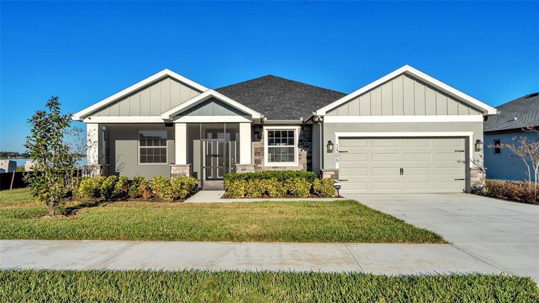 Front exterior of a new home in , Lake Alfred, FL, highlighting curb appeal (Image 28). Front exterior of a new home in , Lake Alfred, FL, highlighting curb appeal (Image 28).