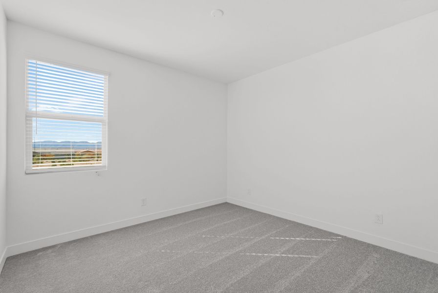 Spacious, unfurnished interior of a new home in Artisan at Asante, Surprise (Image 29).