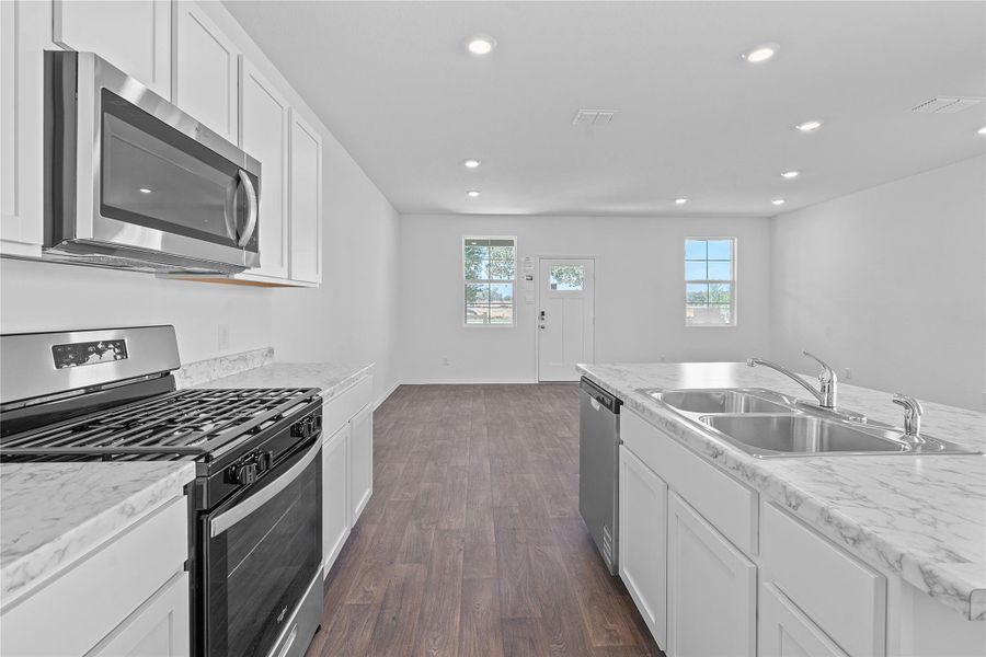Furnished interior view inside a new home in Valverde, Bastrop (Image 11).