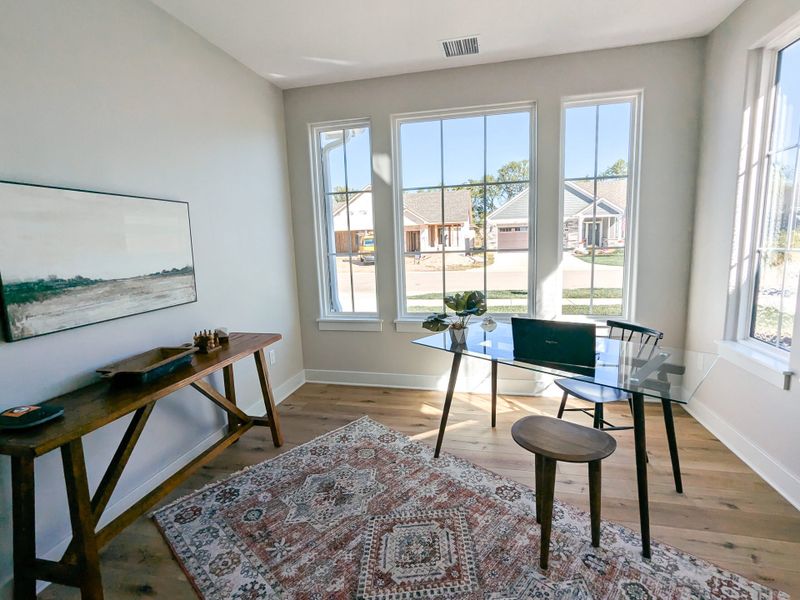 Representative furnished interior of a home built from the Promenade by Perfection Builders in The Courtyards at The Heritage, Andover (Image 7).