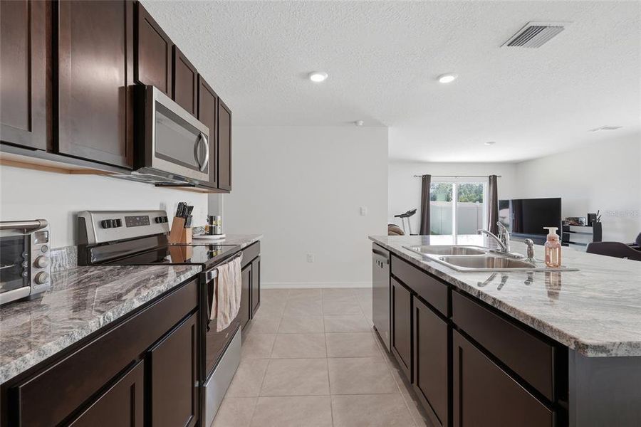 Furnished interior view inside a new home in Avalon Woods, Newberry (Image 6).