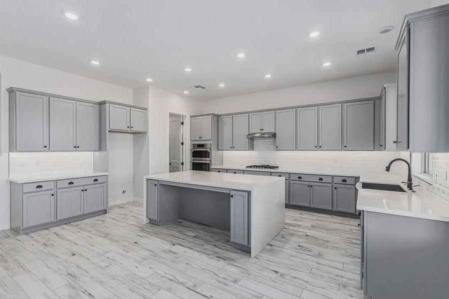 Furnished interior view inside a new home in Valencia at Granite Vista, Waddell (Image 7).
