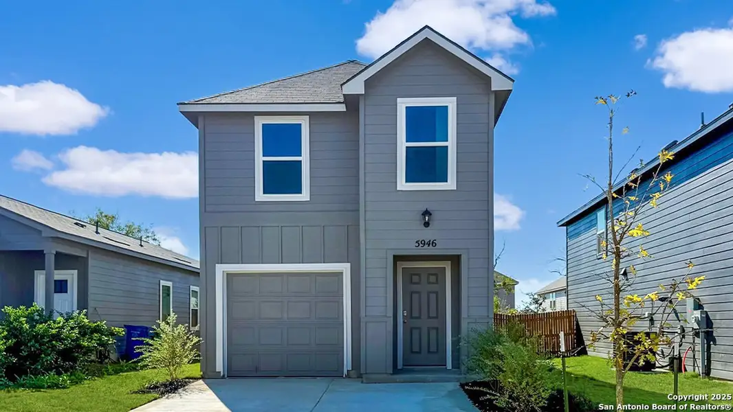 Front exterior of a new home in Blue Ridge Ranch, San Antonio, TX, highlighting curb appeal (Image 1). Front exterior of a new home in Blue Ridge Ranch, San Antonio, TX, highlighting curb appeal (Image 1).