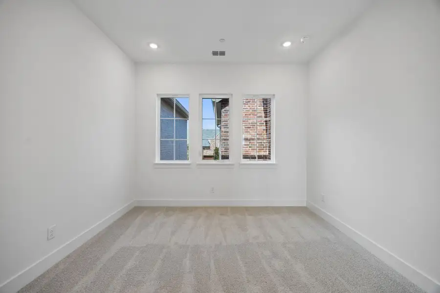 Spacious, unfurnished interior of a new home in Newman Village Townhomes, Frisco (Image 29).
