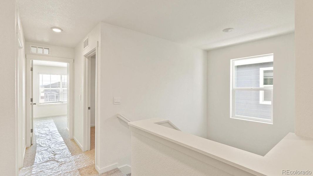 Spacious, unfurnished interior of a new home in The Ridge at Lorson Ranch, Colorado Springs (Image 24).