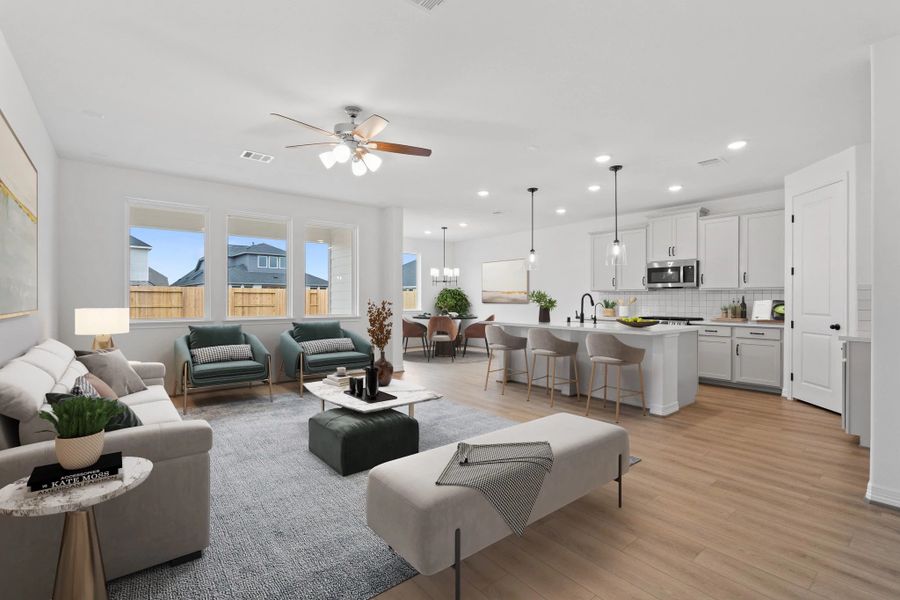 Open concept living space. Note: Sample product photo. Actual exterior and interior selections may vary by homesite. Photo may be virtually staged