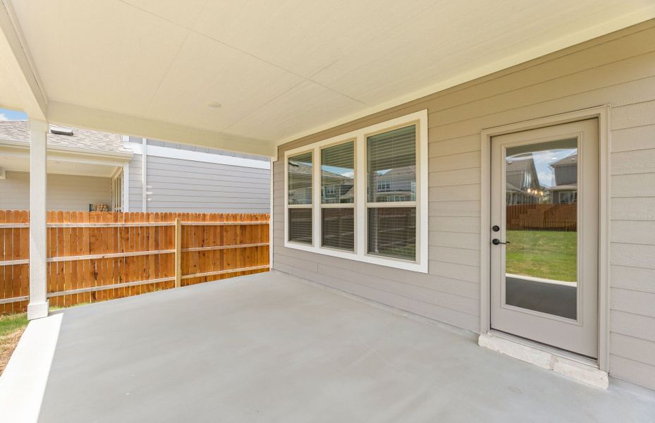 Exterior details and patio area of a home in Santa Rita Ranch, Liberty Hill (Image 20).