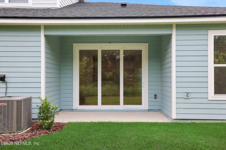 Exterior details and patio area of a home in , Palm Coast (Image 1). Exterior details and patio area of a home in , Palm Coast (Image 1).