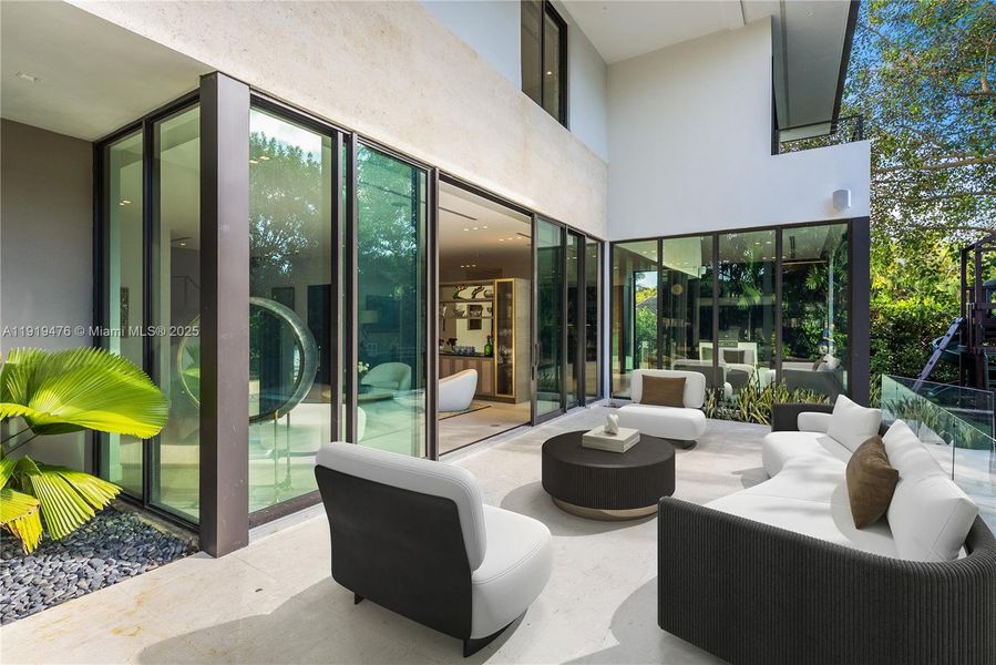 Exterior details and patio area of a home in , Miami Shores (Image 26). Exterior details and patio area of a home in , Miami Shores (Image 26).