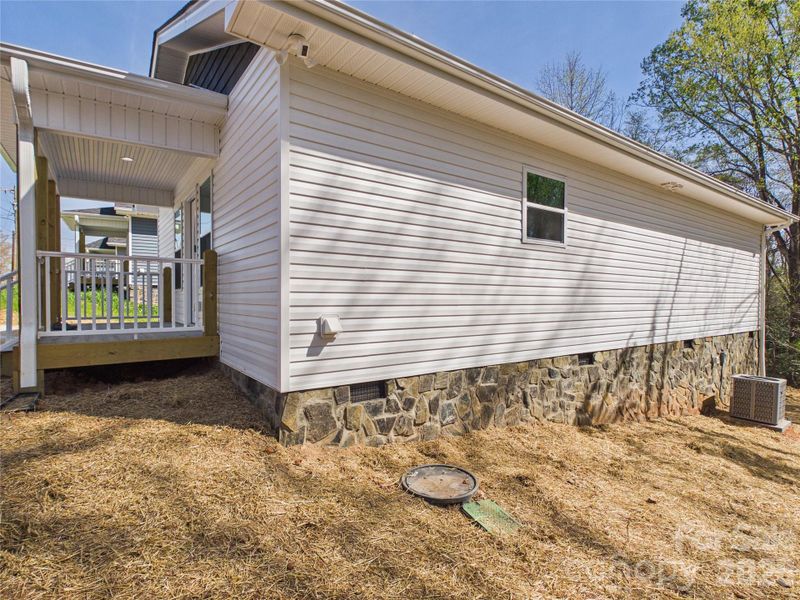 Exterior details and patio area of a home in , Valdese (Image 25).