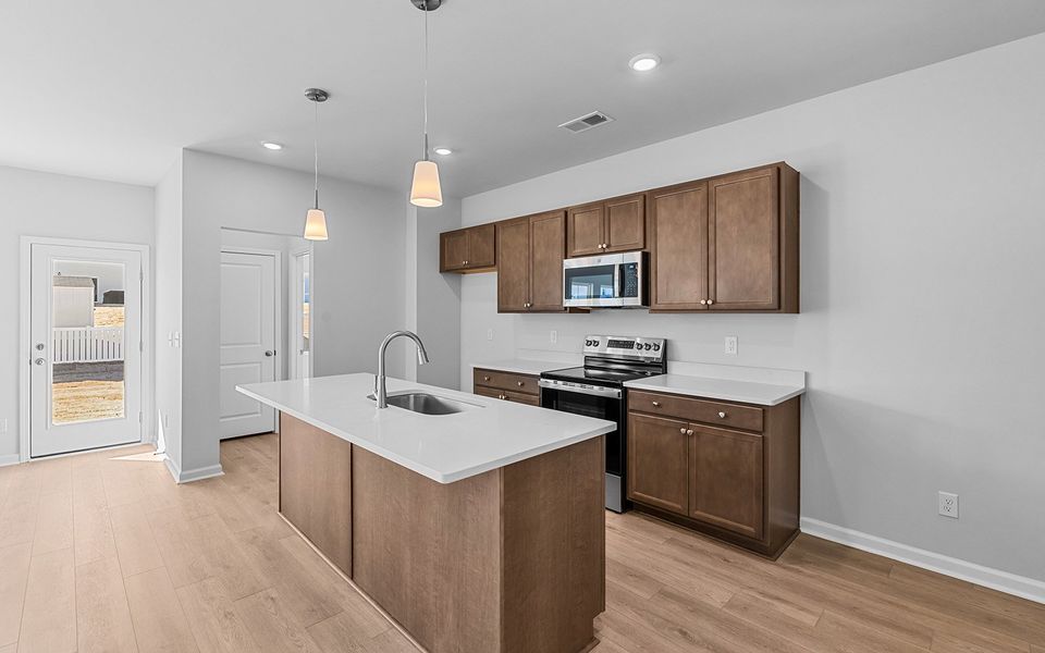Furnished interior view inside a new home in Fieldstone, Lexington (Image 8).