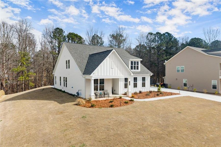 Front exterior of a new home in , Canton, GA, highlighting curb appeal (Image 25).