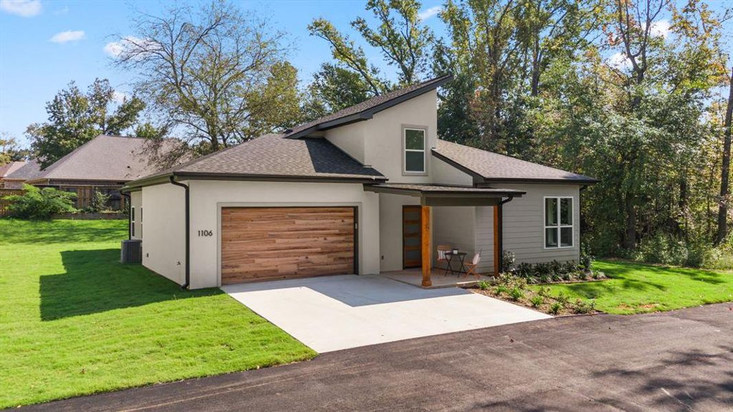 Front exterior of a new home in , Lindale, TX, highlighting curb appeal (Image 1). Front exterior of a new home in , Lindale, TX, highlighting curb appeal (Image 1).