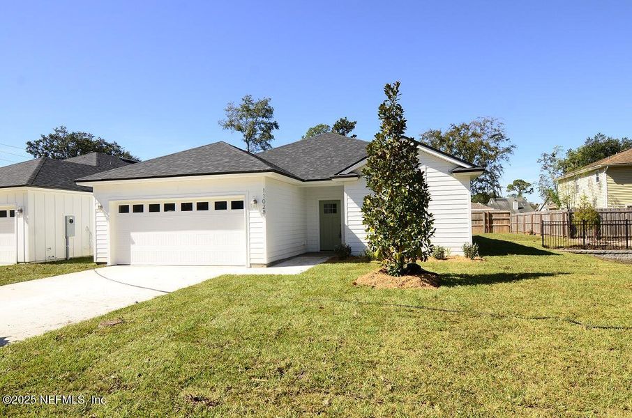Front exterior of a new home in , Jacksonville, FL, highlighting curb appeal (Image 1). Front exterior of a new home in , Jacksonville, FL, highlighting curb appeal (Image 1).