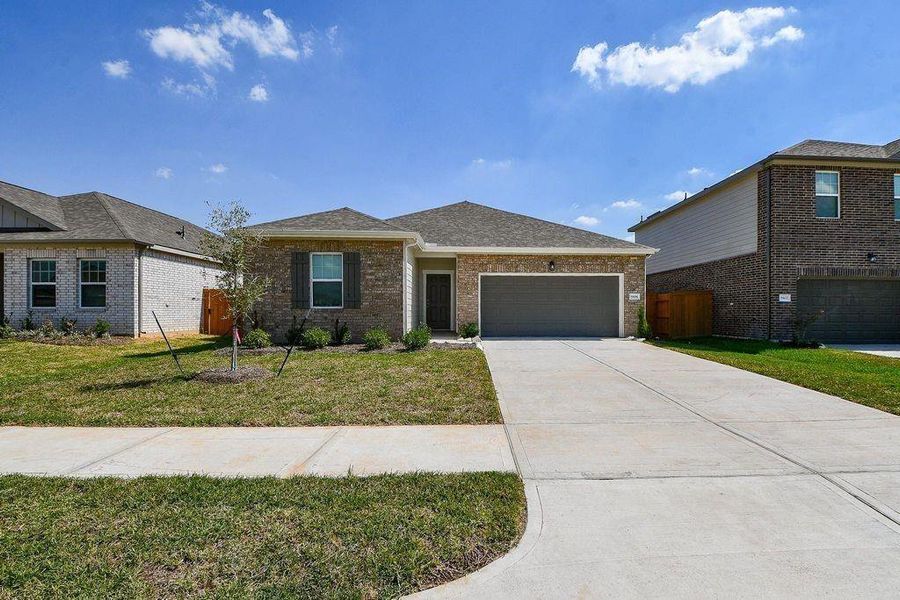 Front exterior of a new home in , Katy, TX, highlighting curb appeal (Image 2). Front exterior of a new home in , Katy, TX, highlighting curb appeal (Image 2).
