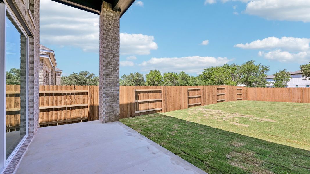 Exterior details and patio area of a home in The Enclave at Bar W Ranch, Leander (Image 21). Exterior details and patio area of a home in The Enclave at Bar W Ranch, Leander (Image 21).