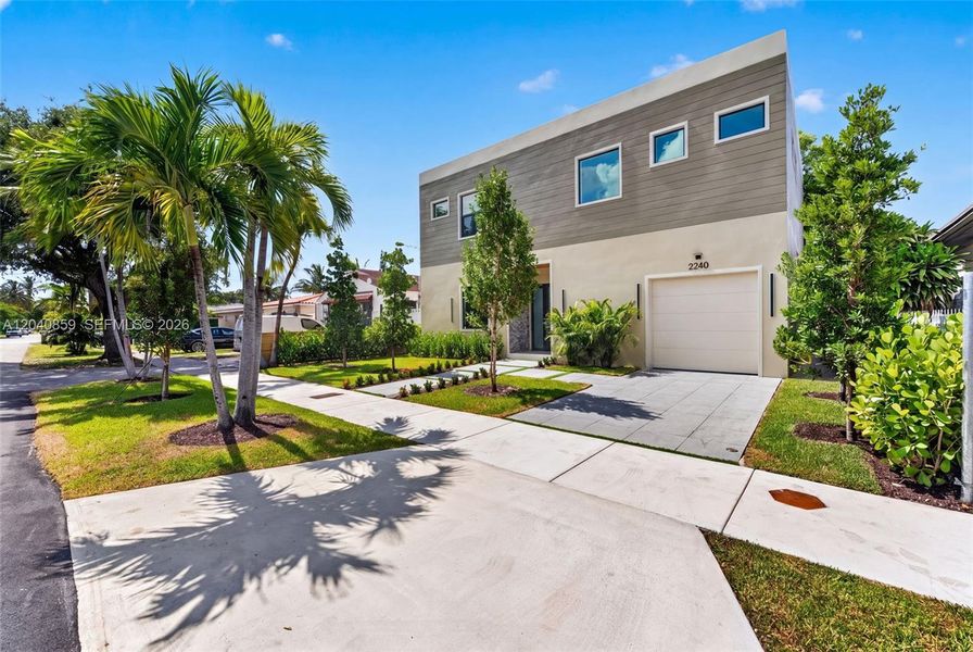 Front exterior of a new home in , Miami, FL, highlighting curb appeal (Image 2). Front exterior of a new home in , Miami, FL, highlighting curb appeal (Image 2).
