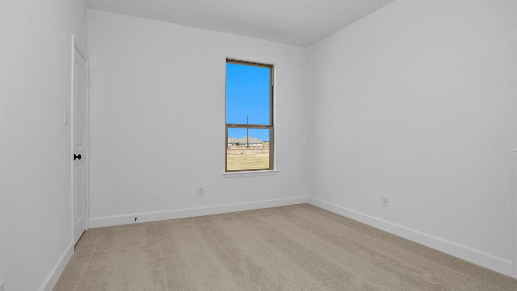 Spacious, unfurnished interior of a new home in Elyson 55', Katy (Image 5).