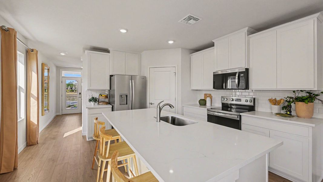 Representative furnished interior of a home built from the Harper by D.R. Horton in Venetian Grove, Vero Beach (Image 6).