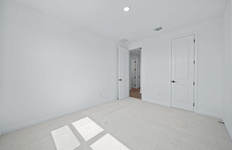 Spacious, unfurnished interior of a new home in 6 Creeks, Kyle (Image 49).