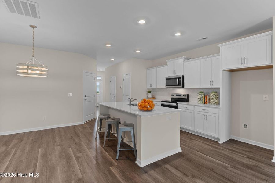 Furnished interior view inside a new home in Coastal Haven Townes, Leland (Image 5).
