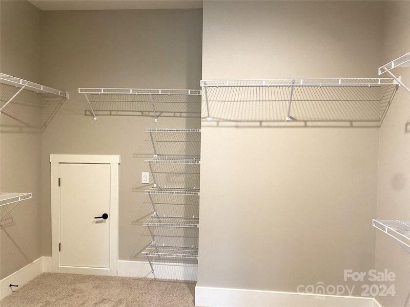 Primary Closet with Storage room