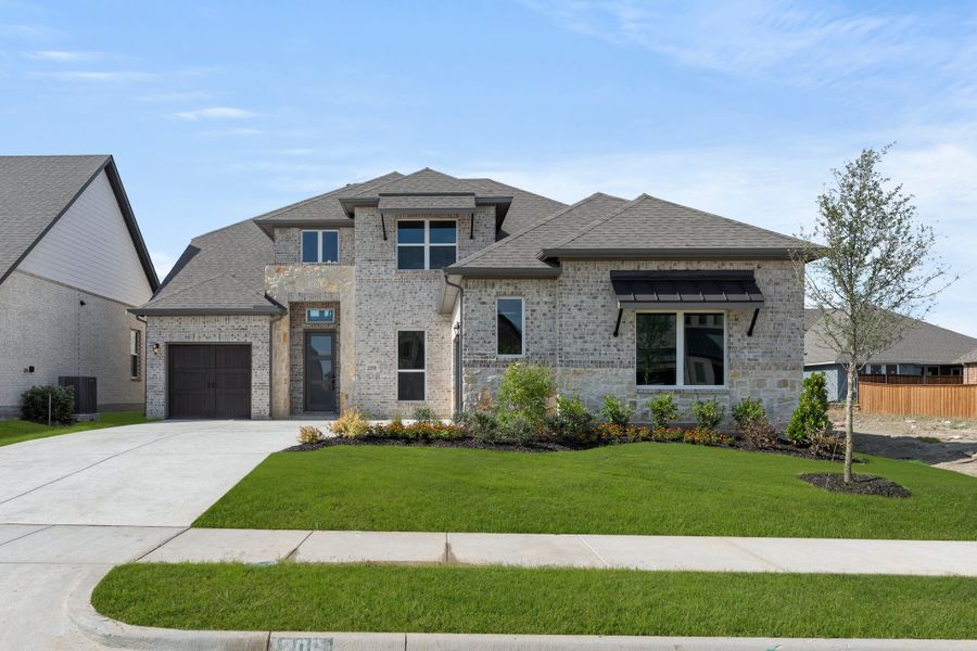 Representative exterior photo of a completed home built from the Edward- 70 ft Home Site by Rockwell Homes in Nelson Lake Estates, Rockwall, TX (Image 32). Representative exterior photo of a completed home built from the Edward- 70 ft Home Site by Rockwell Homes in Nelson Lake Estates, Rockwall, TX (Image 32).