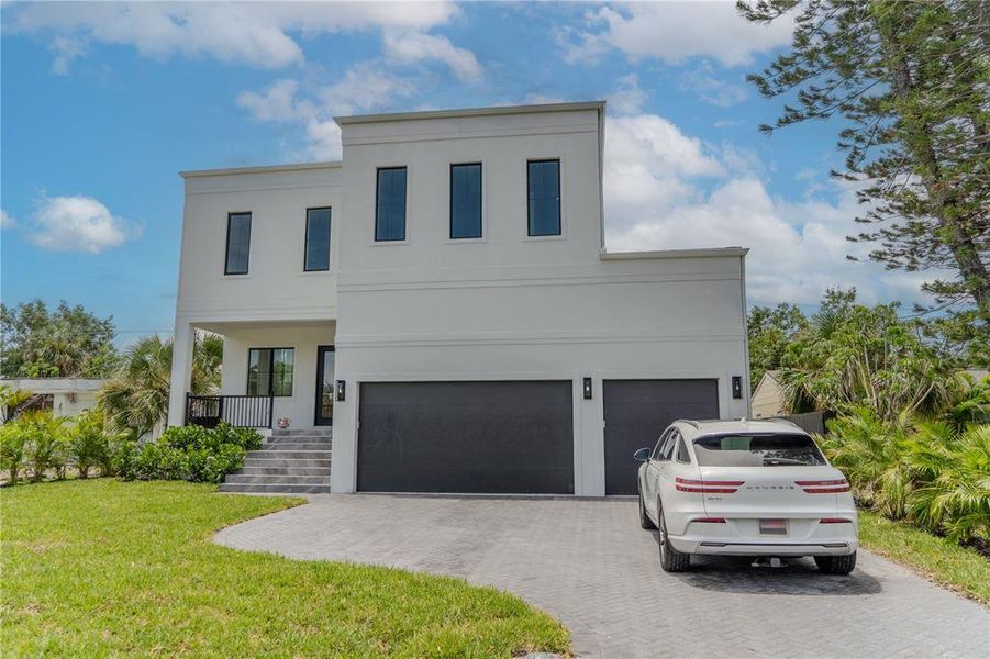 Front exterior of a new home in , Tampa, FL, highlighting curb appeal (Image 1). Front exterior of a new home in , Tampa, FL, highlighting curb appeal (Image 1).