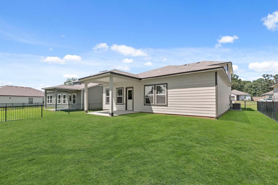 Front exterior of a new home in Lakes at Crockett Martin, Conroe, TX, highlighting curb appeal (Image 1). Front exterior of a new home in Lakes at Crockett Martin, Conroe, TX, highlighting curb appeal (Image 1).