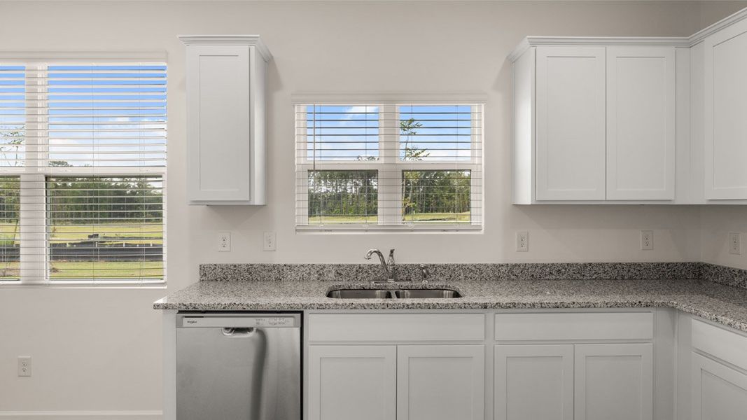 Furnished interior view inside a new home in Oakchase at Hampton, Hampton (Image 9).